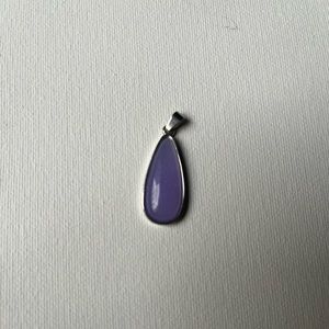 Purple stone and silver tone teardrop pendant